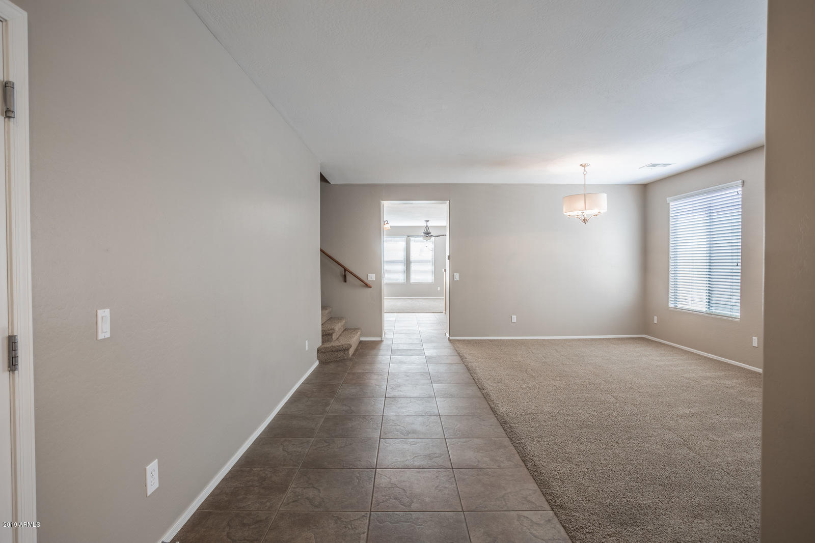 3101 South Joshua Tree Lane Gilbert, AZ 85295 - Photo 5 of 88 a view of an empty room and window