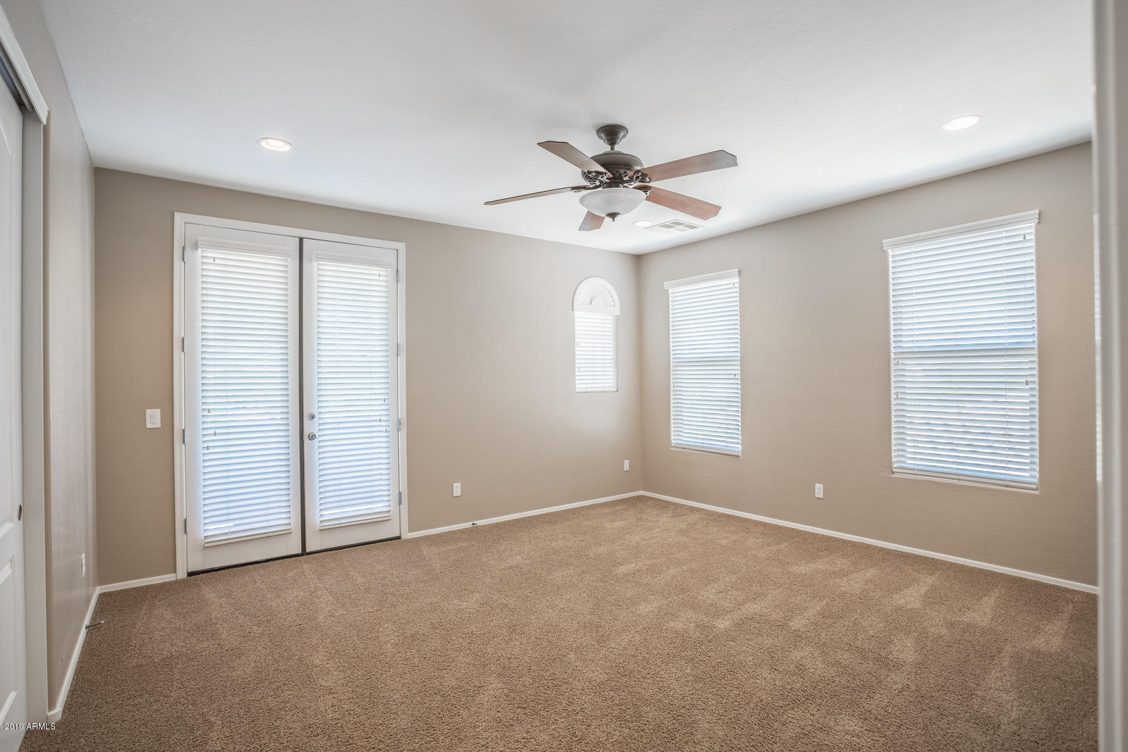 3101 South Joshua Tree Lane Gilbert, AZ 85295 - Photo 52 of 88 a view of an empty room with a window