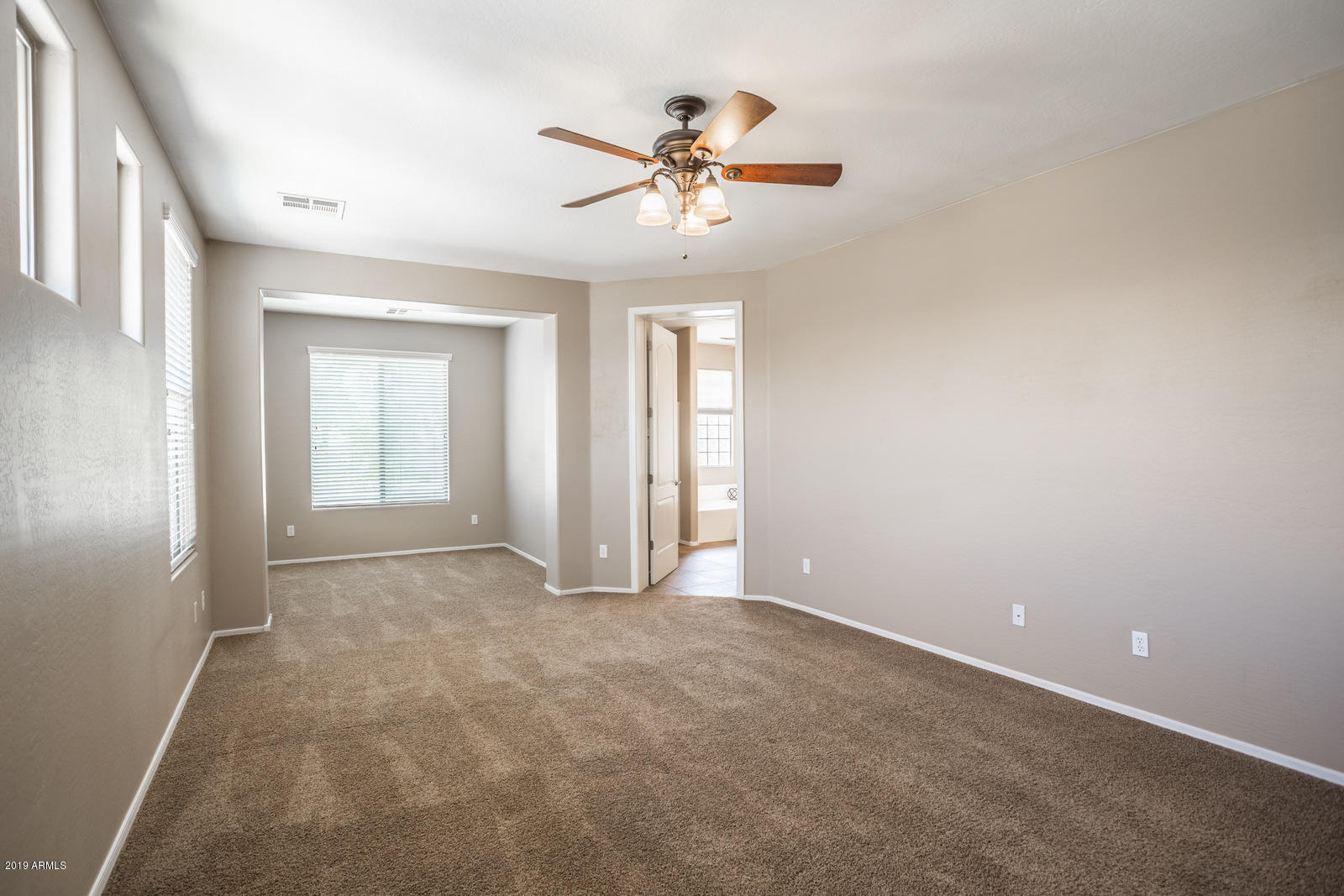 3101 South Joshua Tree Lane Gilbert, AZ 85295 - Photo 59 of 88 a view of an empty room with a window