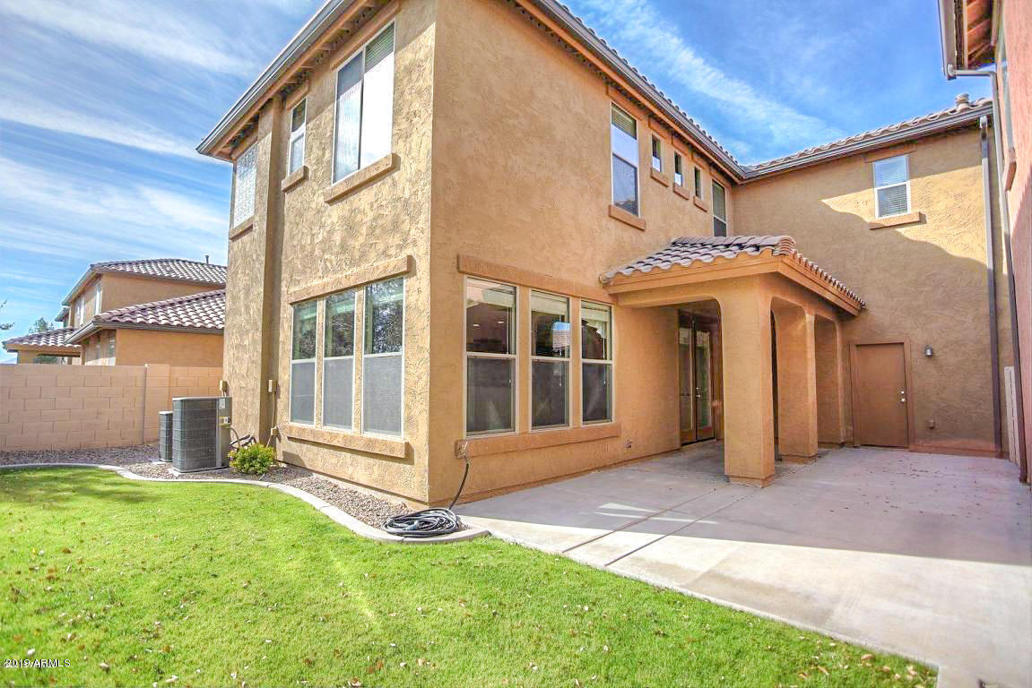 3101 South Joshua Tree Lane Gilbert, AZ 85295 - Photo 71 of 88 a view of a house with backyard and porch