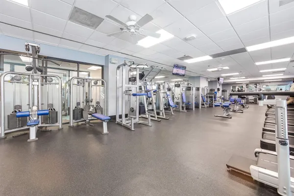 a gym room with gym equipment