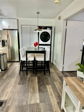 a view of dining room and wooden floor