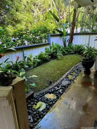 a view of a garden with a lake