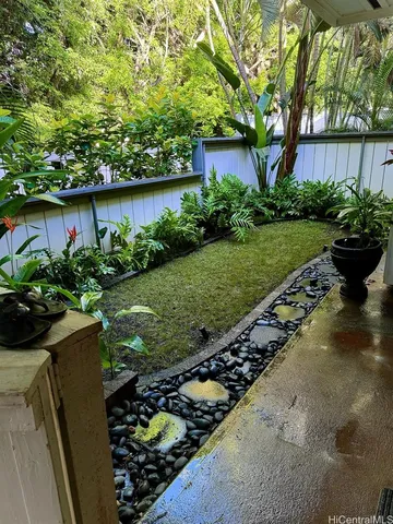 a view of a garden with a lake