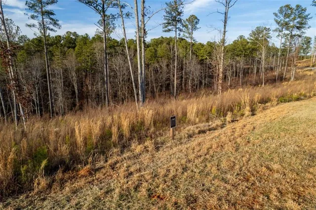 an outdoor sitting area with furniture