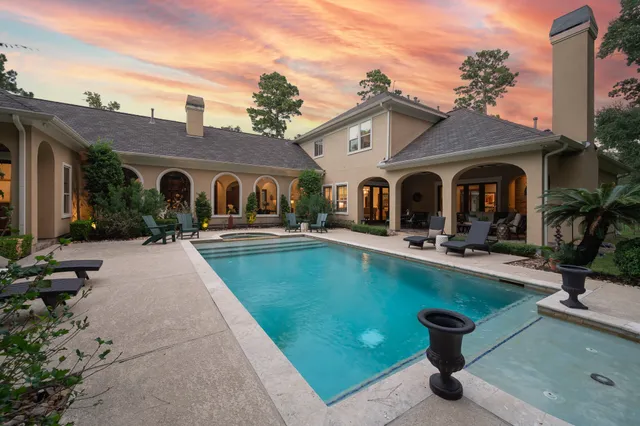 a view of a house with a swimming pool