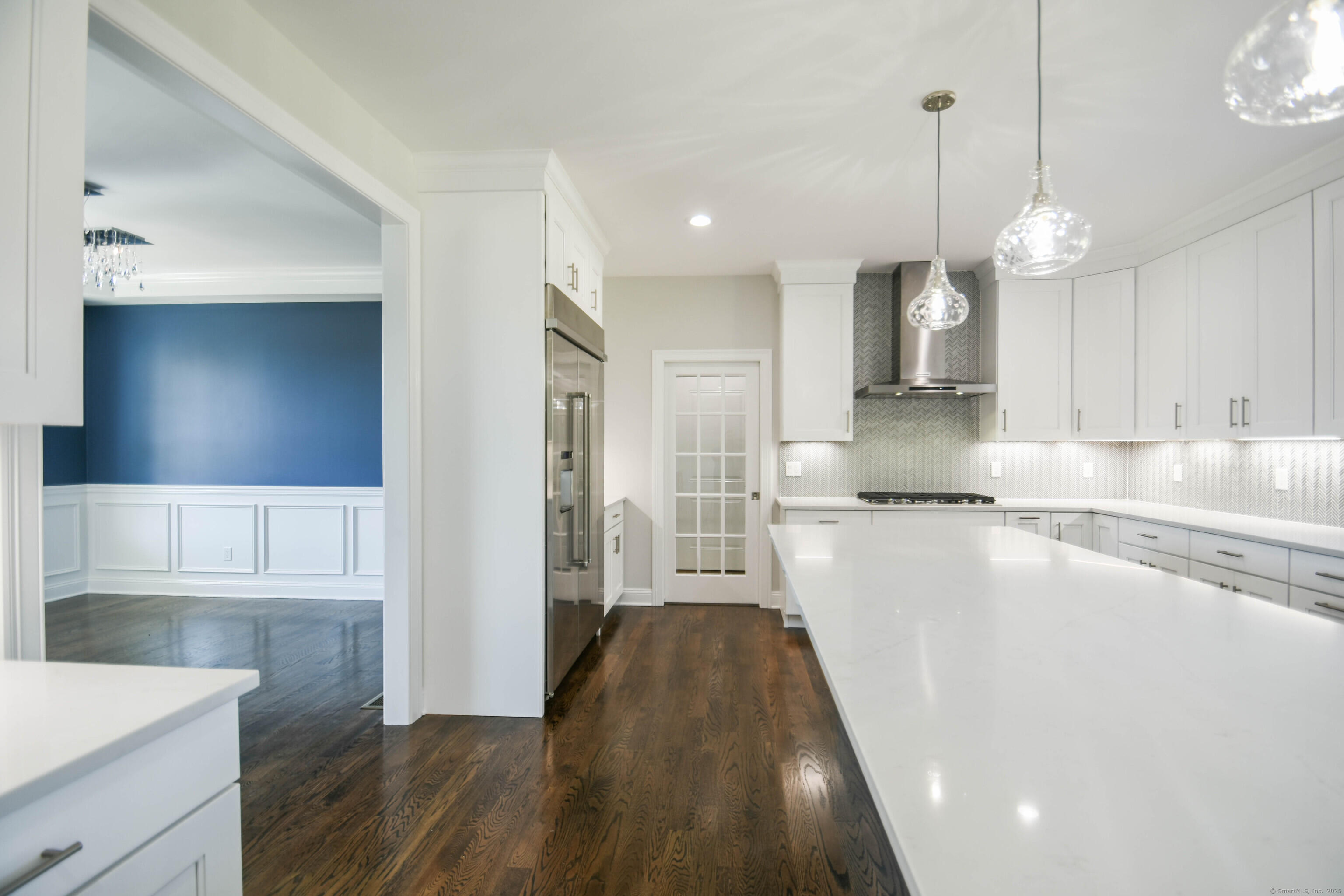 1481 Marion Road Cheshire, CT 06410 - Photo 20 of 30 a kitchen with kitchen island a counter space a sink and appliances