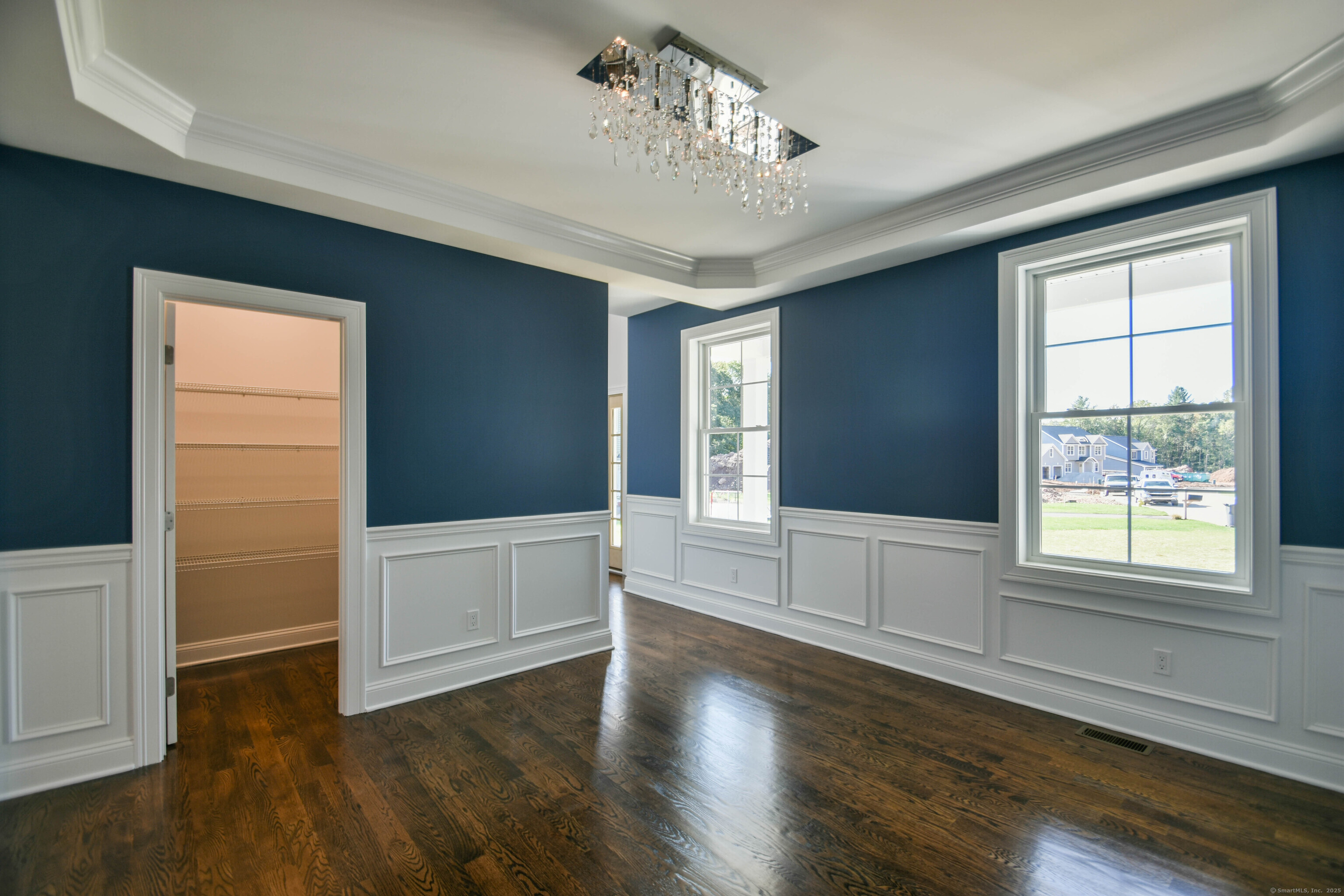 1481 Marion Road Cheshire, CT 06410 - Photo 2 of 30 a view of an empty room with wooden floor and a window