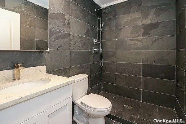 a bathroom with a toilet and a sink