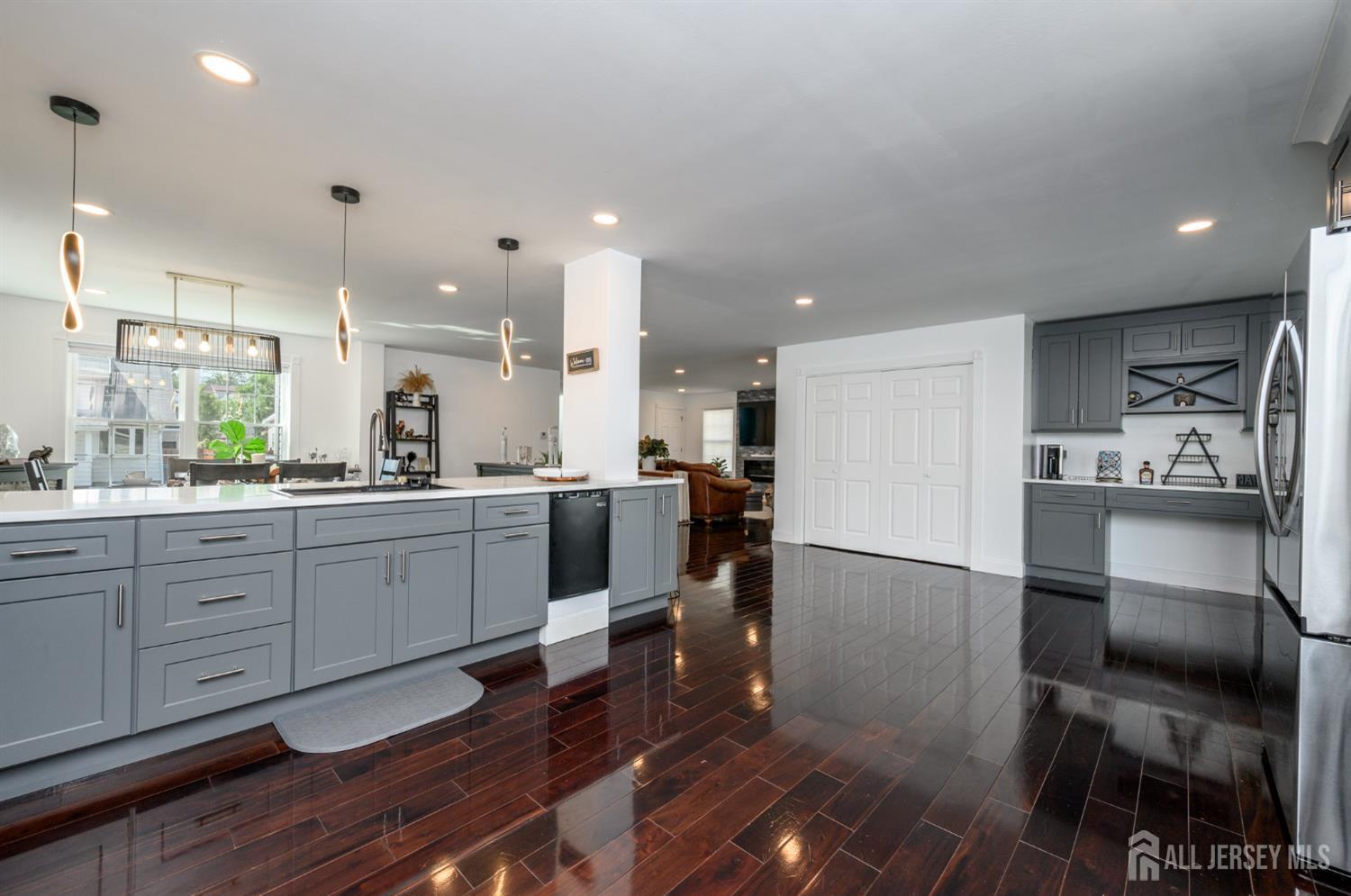 289 Indiana Street Union, NJ 07083 - Photo 17 of 45 a kitchen with a sink stainless steel appliances and cabinets