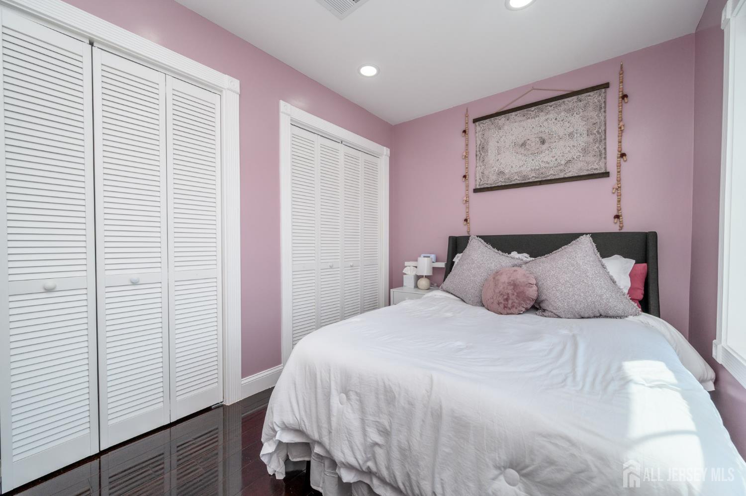 289 Indiana Street Union, NJ 07083 - Photo 28 of 45 a bedroom with a bed and a window