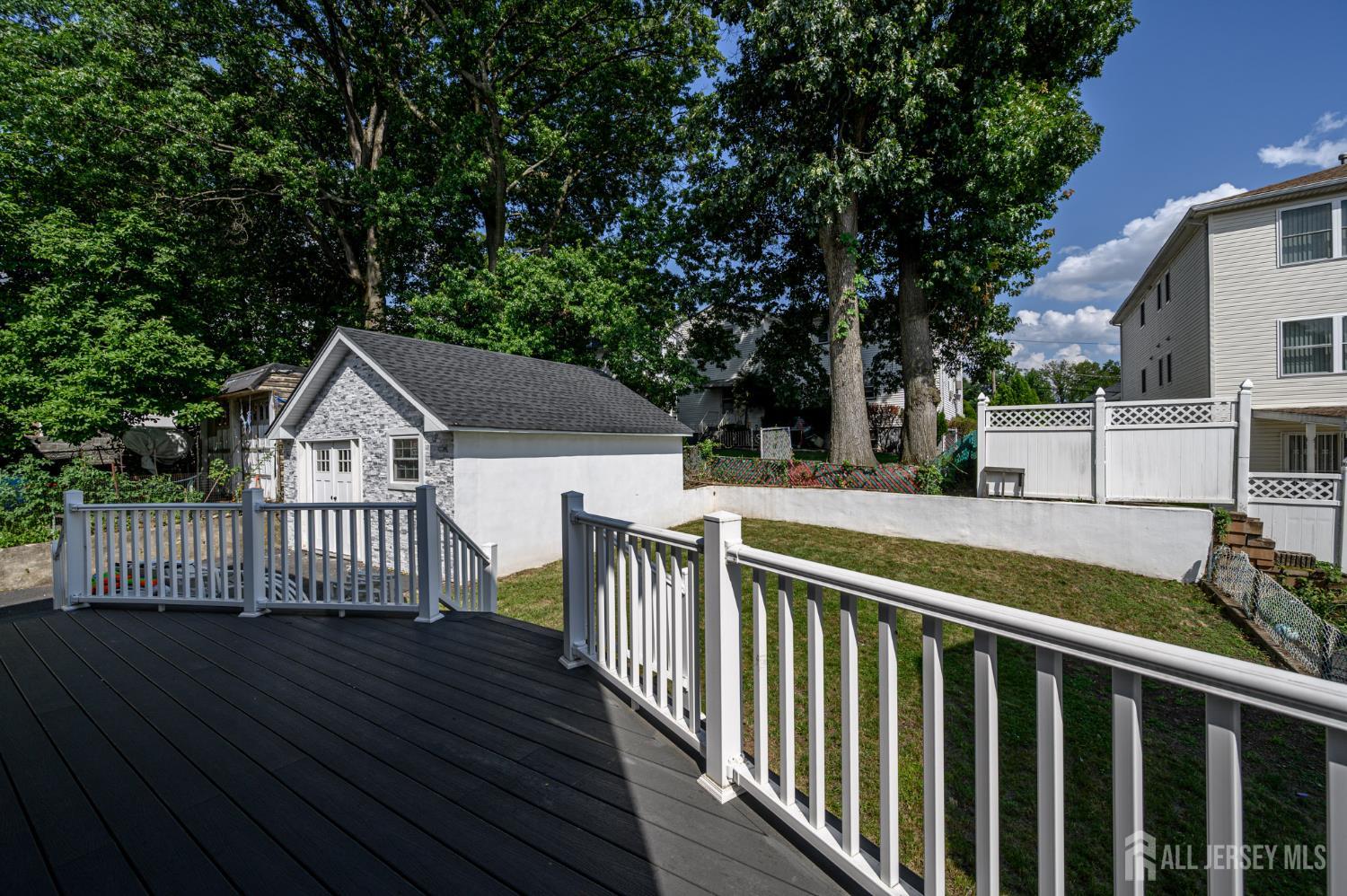 289 Indiana Street Union, NJ 07083 - Photo 40 of 45 a view of a house and wooden fence