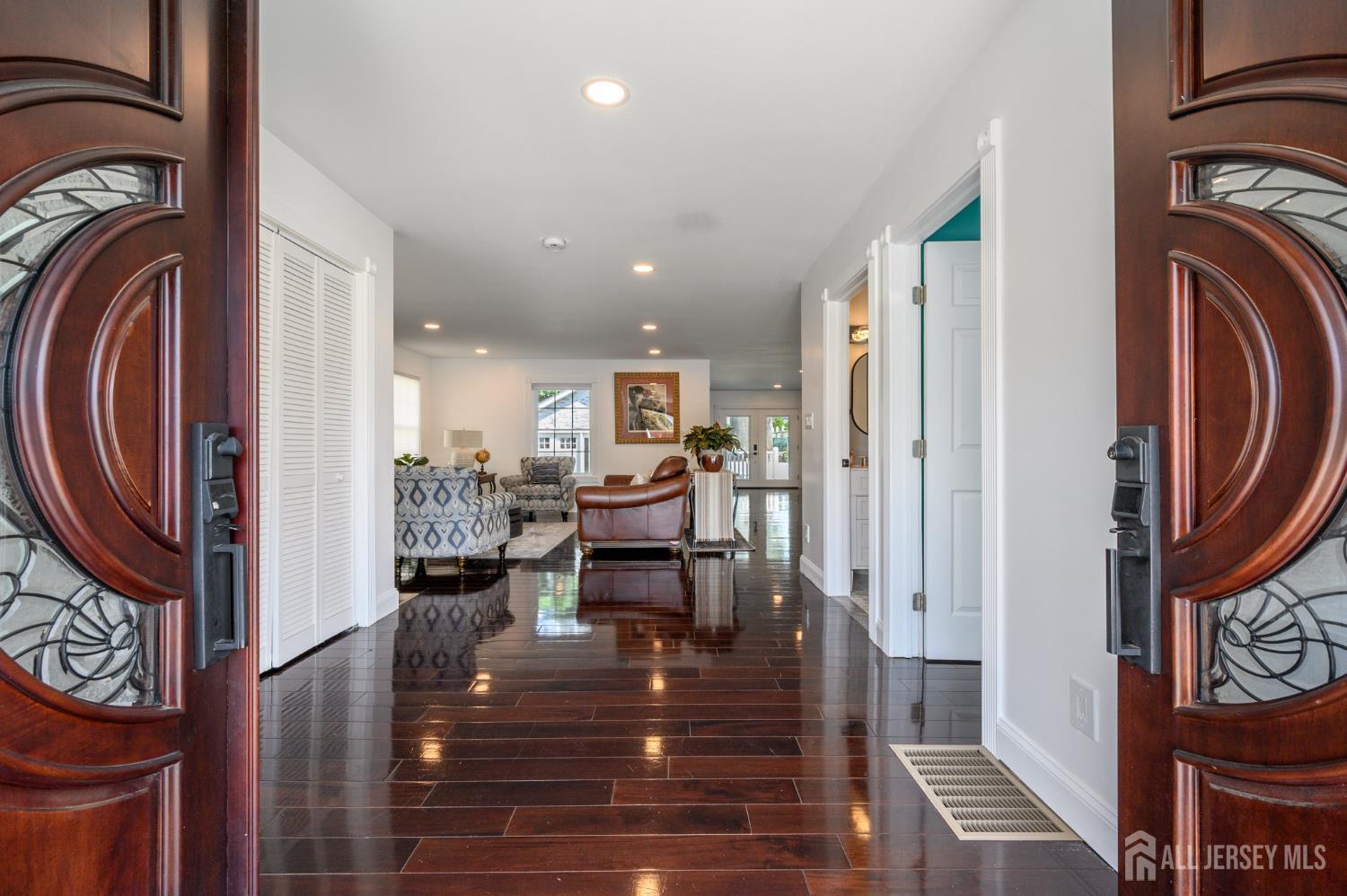289 Indiana Street Union, NJ 07083 - Photo 4 of 45 a view of a hallway with washer and dryer