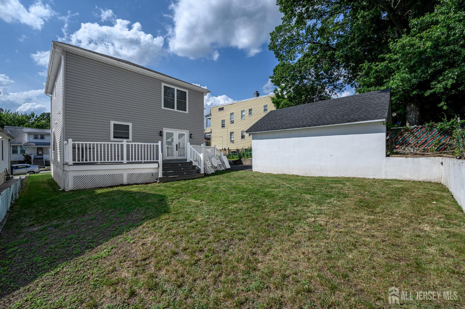 289 Indiana Street Union, NJ 07083 - Photo 42 of 45 a view of house with backyard and garden