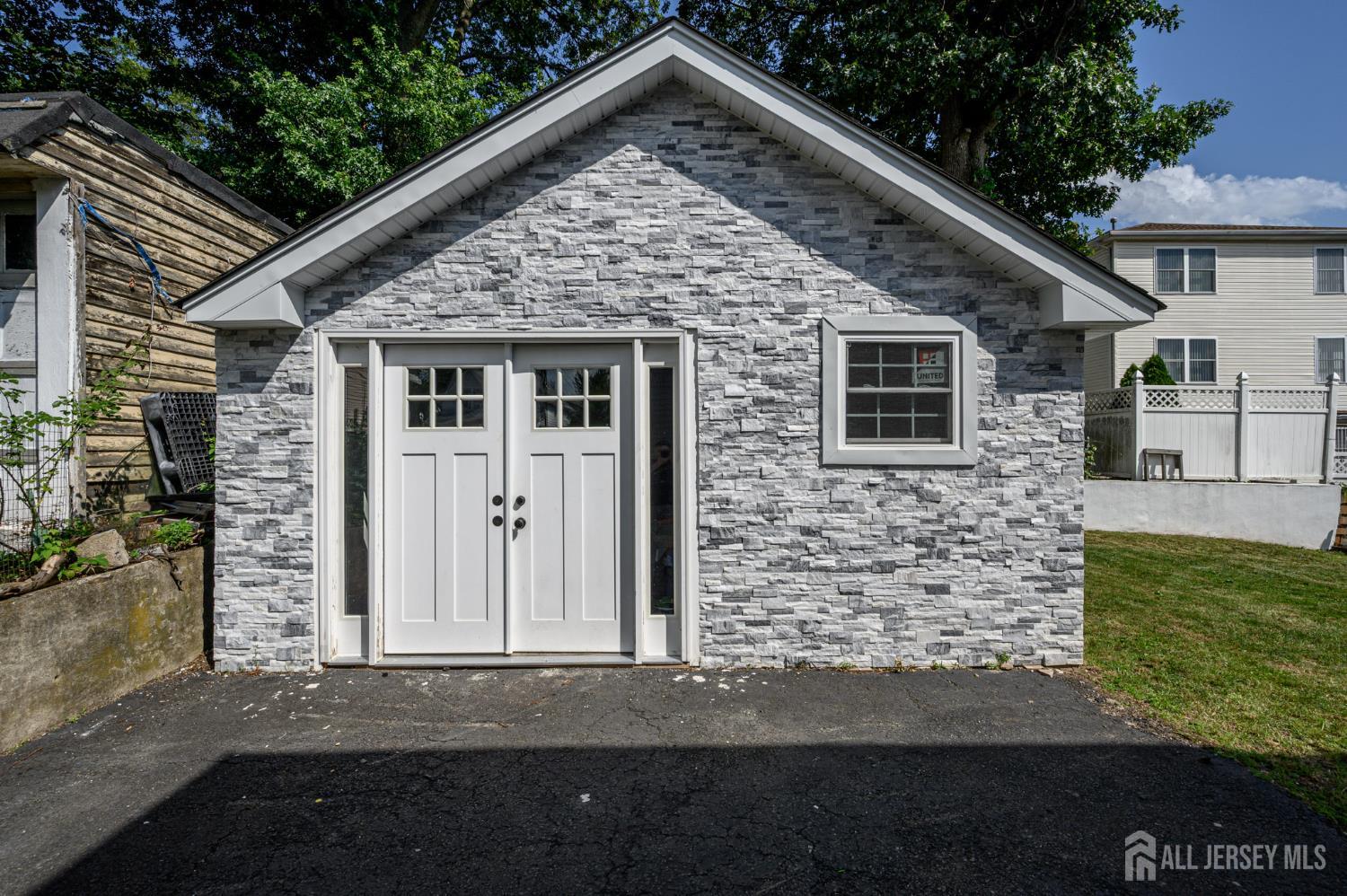 289 Indiana Street Union, NJ 07083 - Photo 44 of 45 a front view of a house with garage