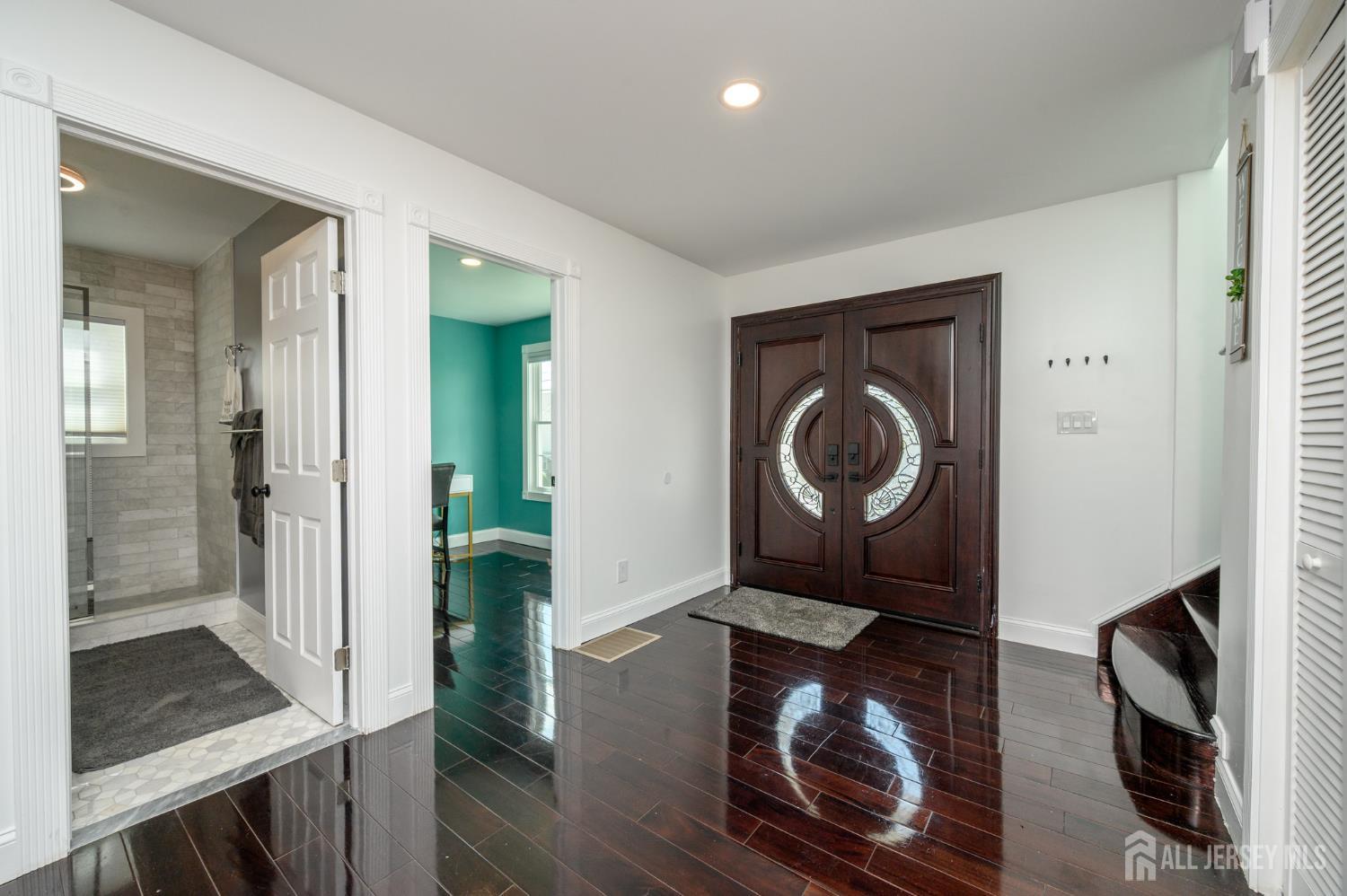 289 Indiana Street Union, NJ 07083 - Photo 5 of 45 a living room with furniture and a fireplace