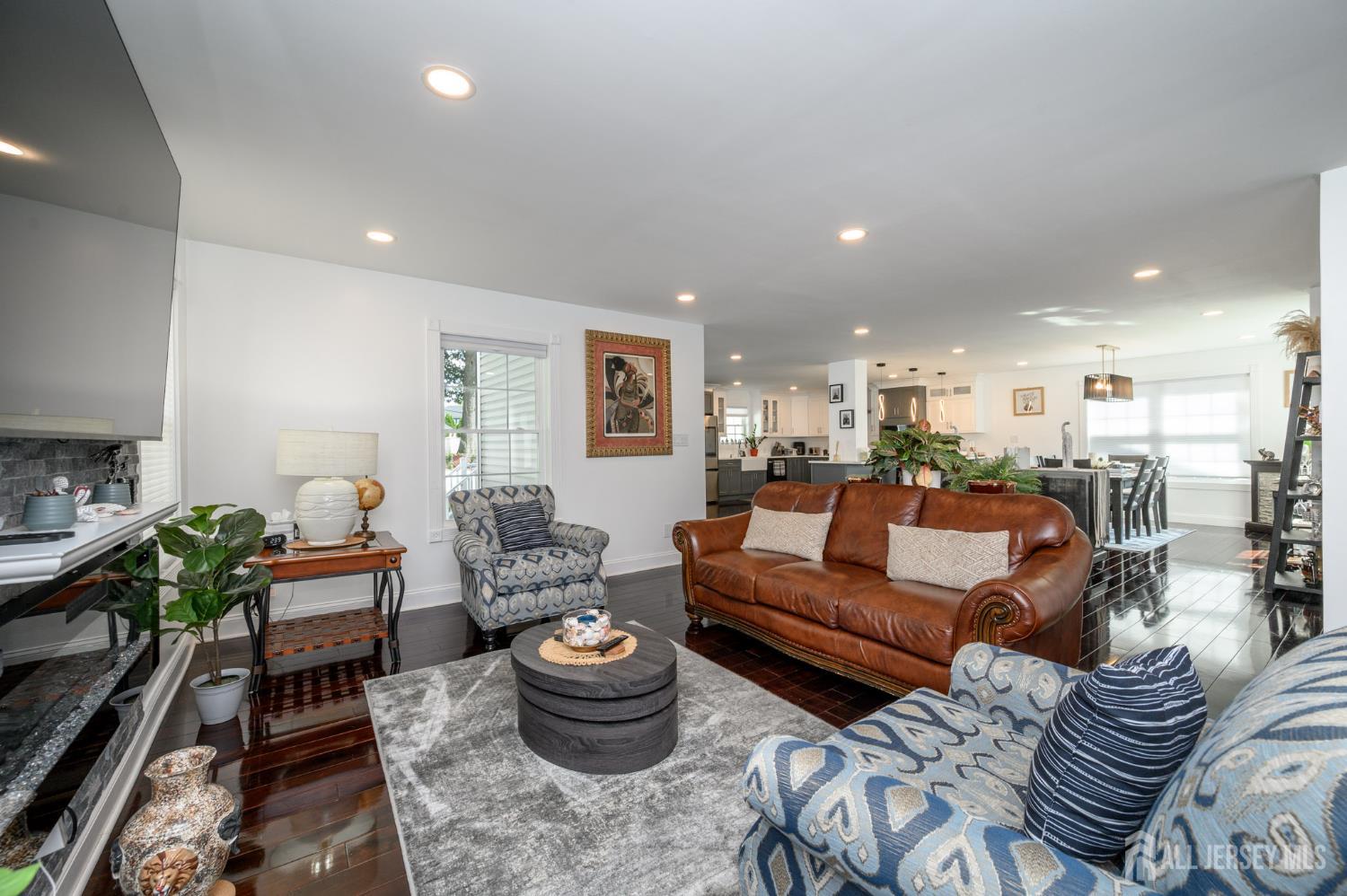 289 Indiana Street Union, NJ 07083 - Photo 10 of 45 a living room with furniture a rug and a window