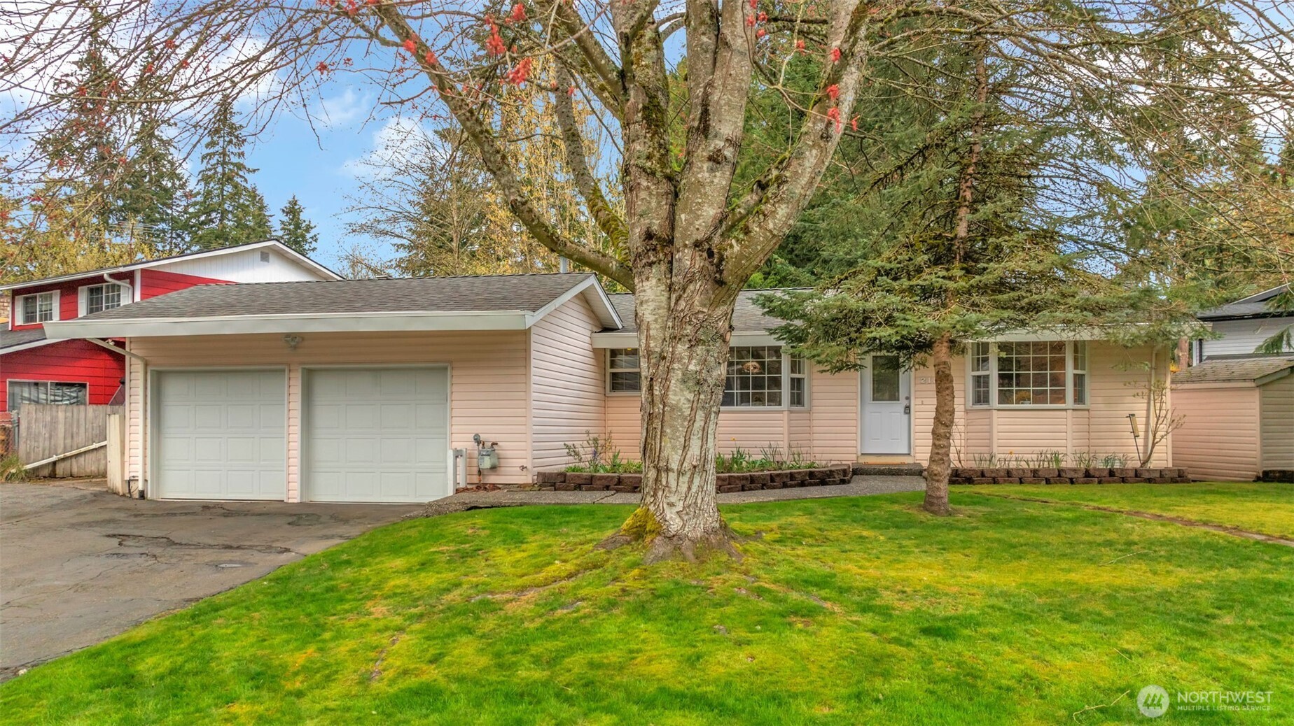 front view of a house with a yard