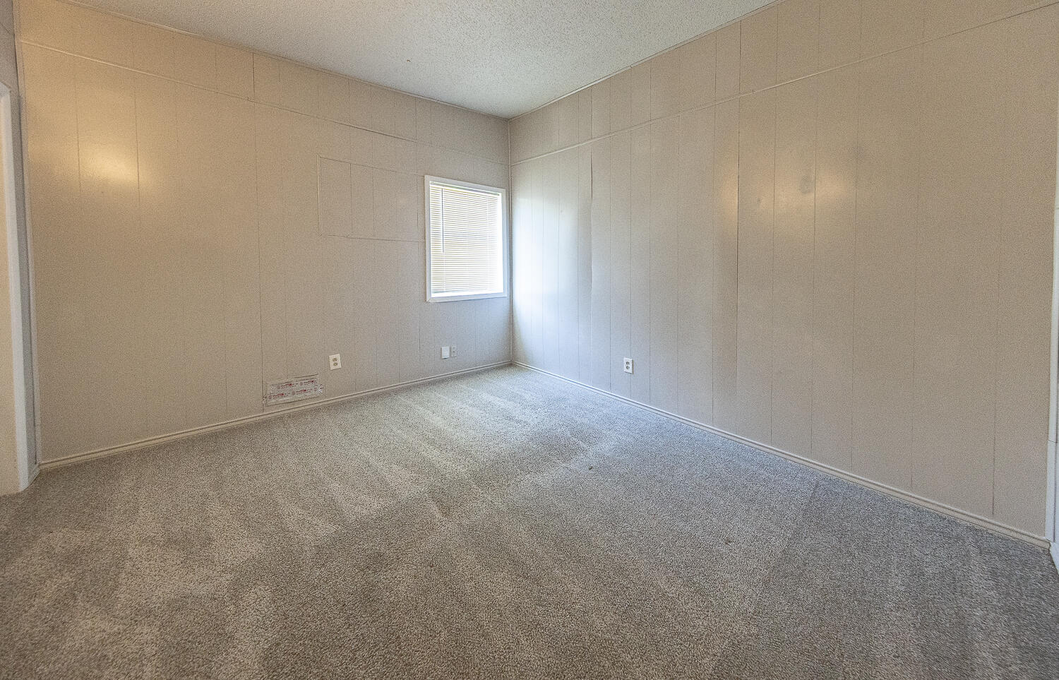 4409 44th Street Lubbock, TX 79414 - Photo 14 of 26 a view of an empty room and window