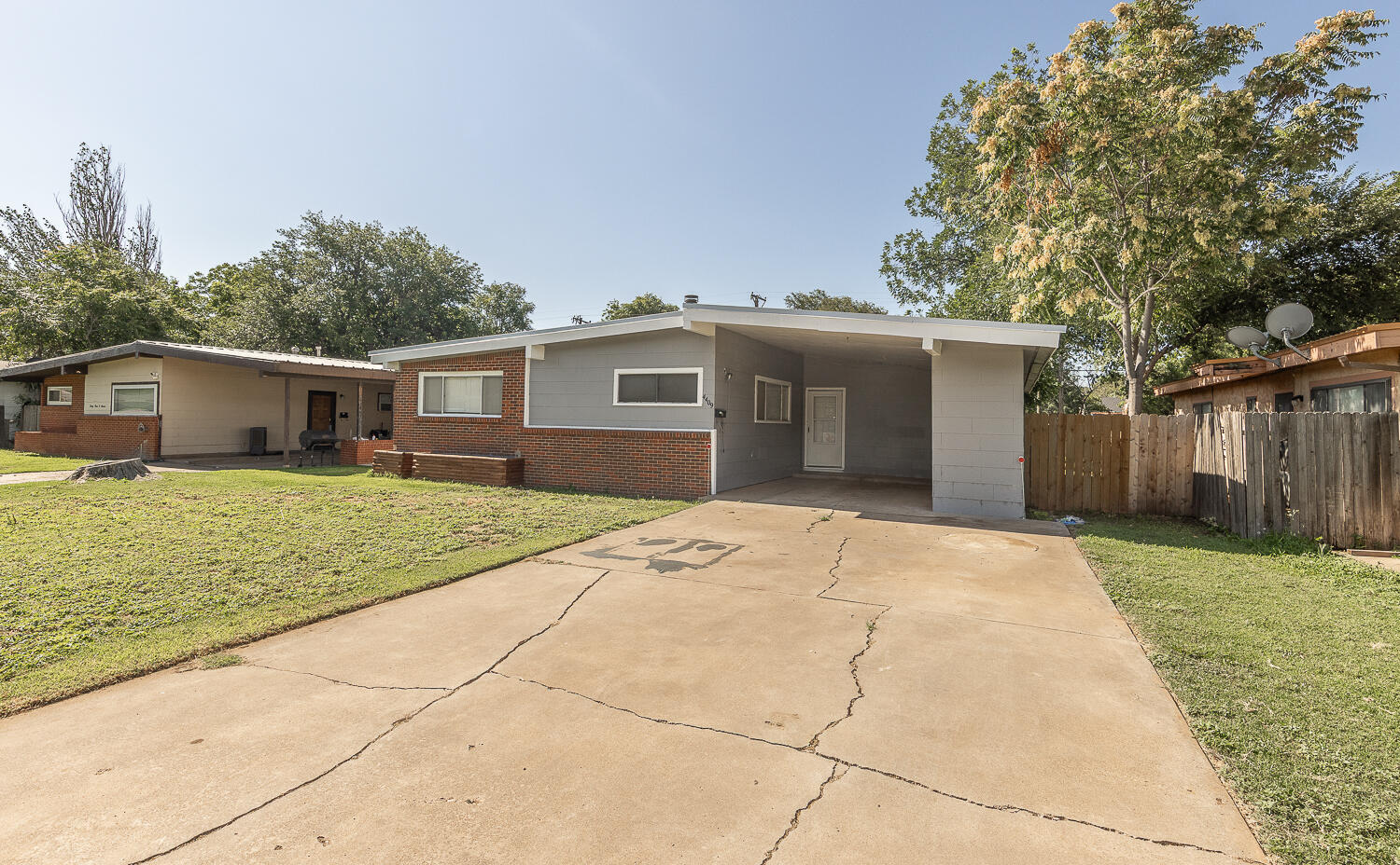 4409 44th Street Lubbock, TX 79414 - Photo 24 of 26 a house view with a backyard space