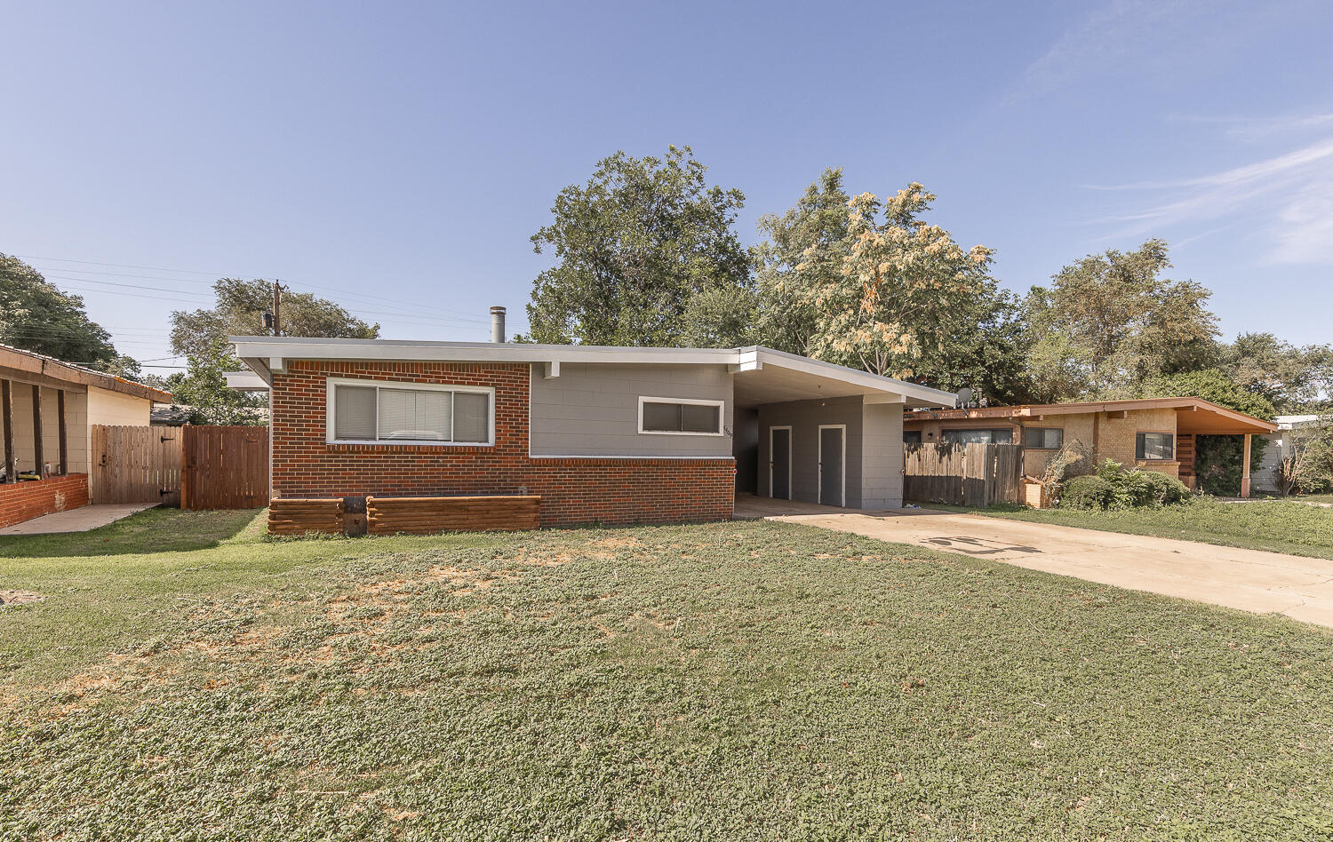 4409 44th Street Lubbock, TX 79414 - Photo 26 of 26 a front view of a house with a yard