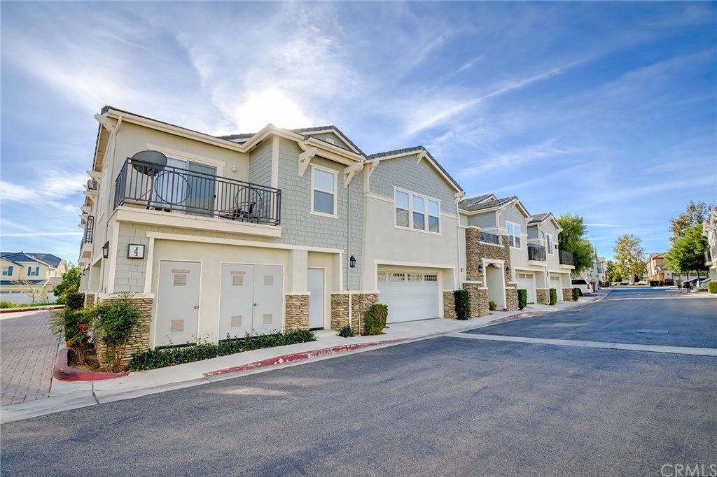 7331 Shelby Place, Unit 23 Rancho Cucamonga, CA 91739 - Photo 28 of 48 a view of a building with a street