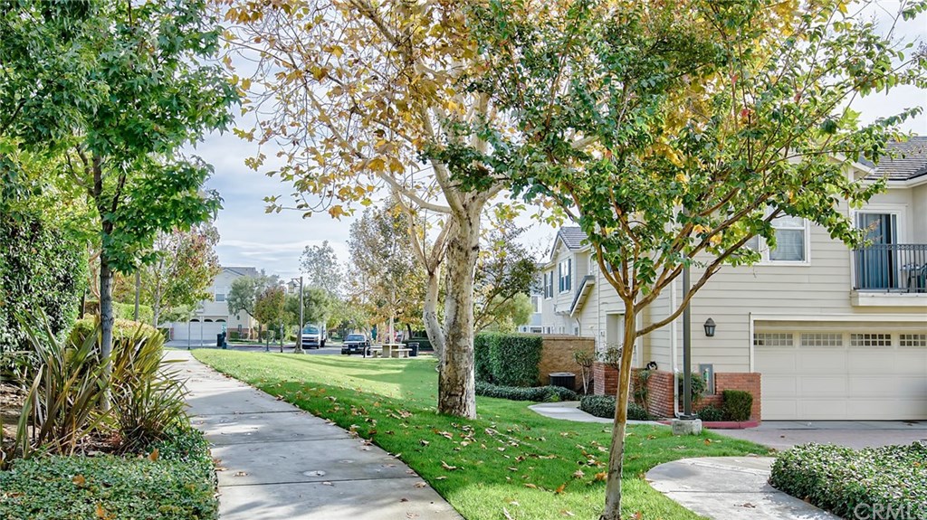 7331 Shelby Place, Unit 23 Rancho Cucamonga, CA 91739 - Photo 31 of 48 a view of a yard with plants and trees