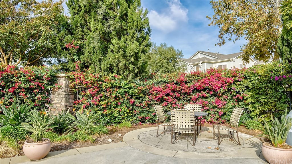 7331 Shelby Place, Unit 23 Rancho Cucamonga, CA 91739 - Photo 32 of 48 a view of a table and chair in the backyard