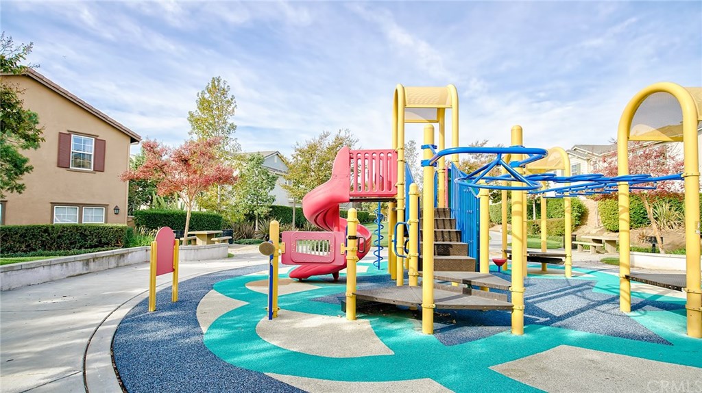 7331 Shelby Place, Unit 23 Rancho Cucamonga, CA 91739 - Photo 39 of 48 a backyard of a house with outdoor seating