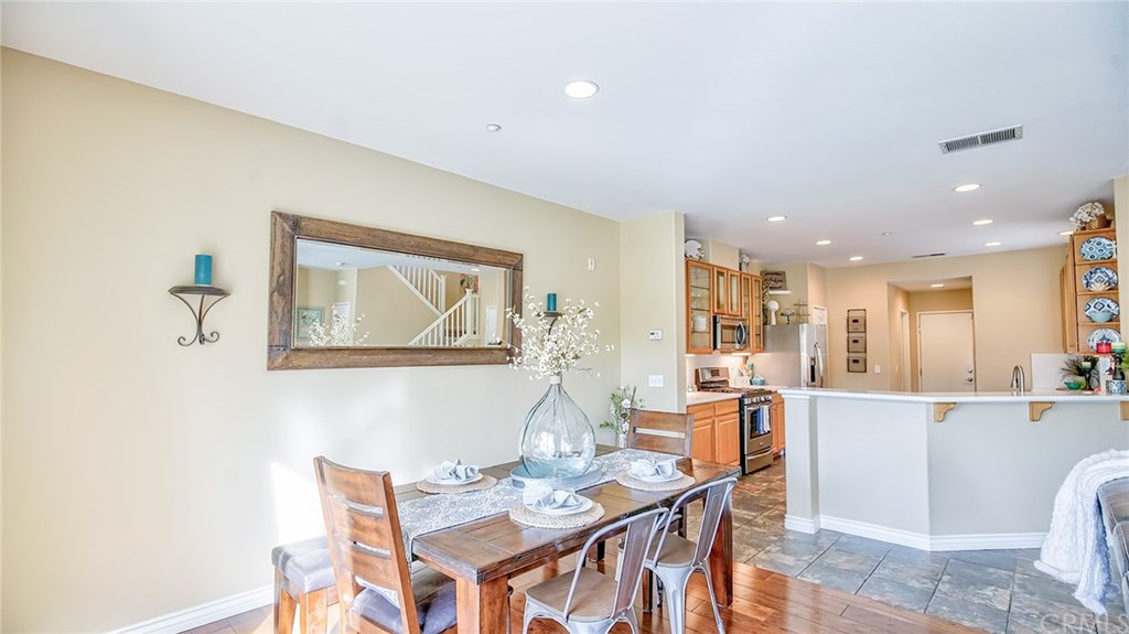 7331 Shelby Place, Unit 23 Rancho Cucamonga, CA 91739 - Photo 5 of 48 a dining room with furniture and window