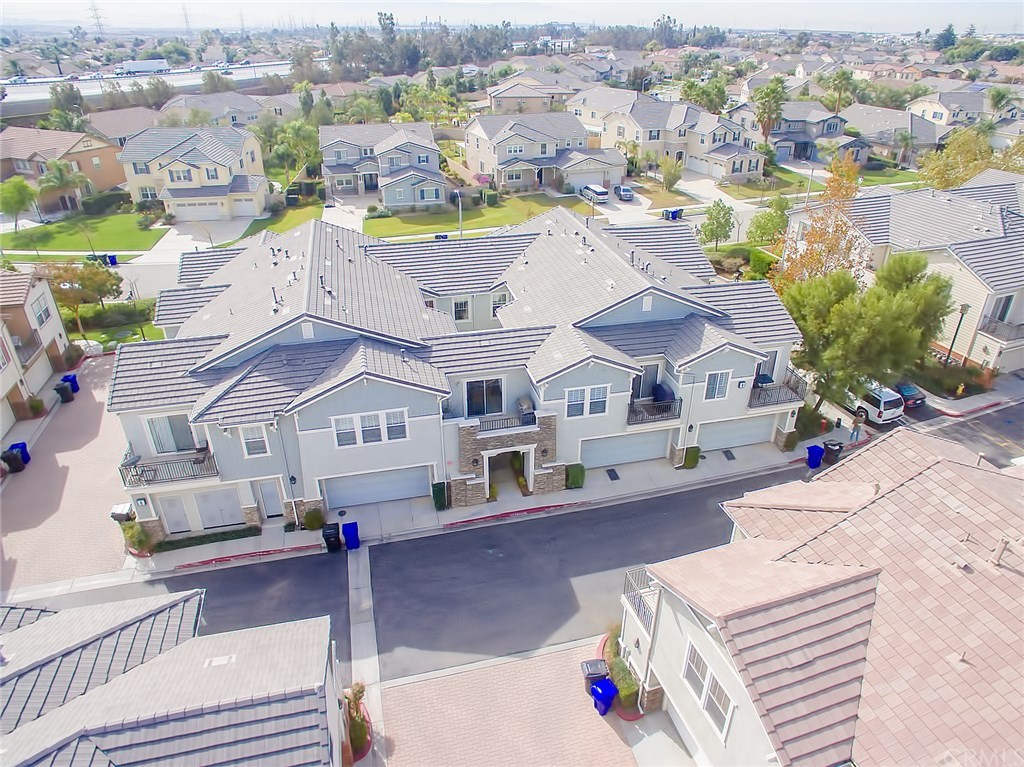 7331 Shelby Place, Unit 23 Rancho Cucamonga, CA 91739 - Photo 41 of 48 an aerial view of residential houses with outdoor space and parking