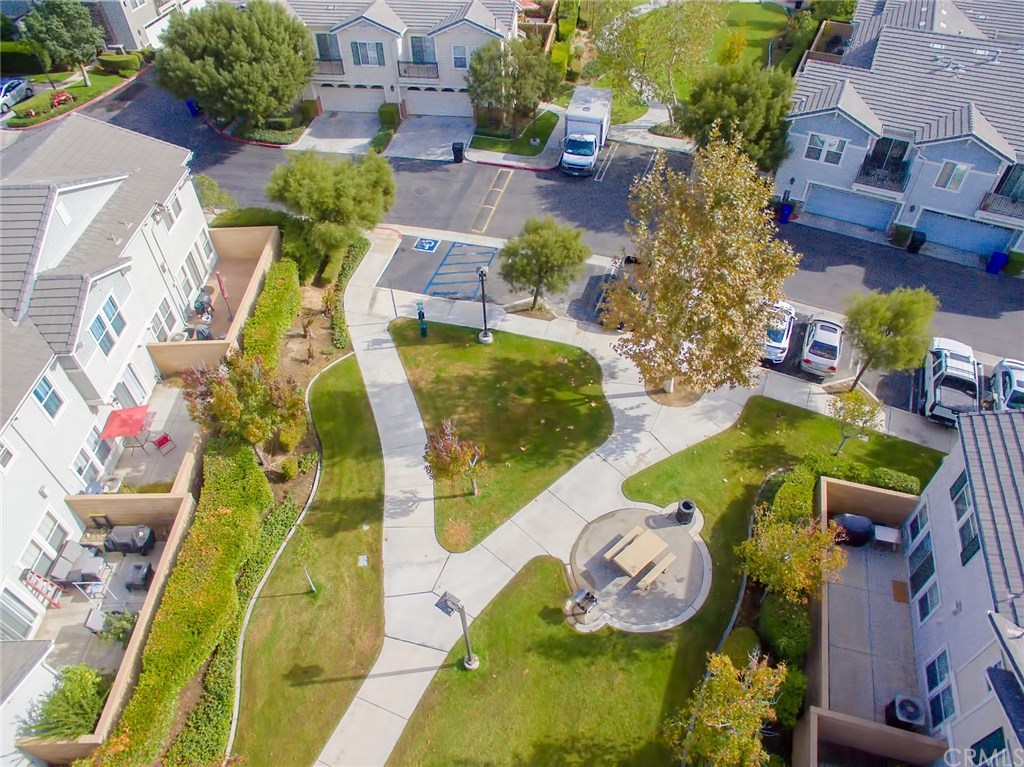 7331 Shelby Place, Unit 23 Rancho Cucamonga, CA 91739 - Photo 45 of 48 an aerial view of a house with a swimming pool
