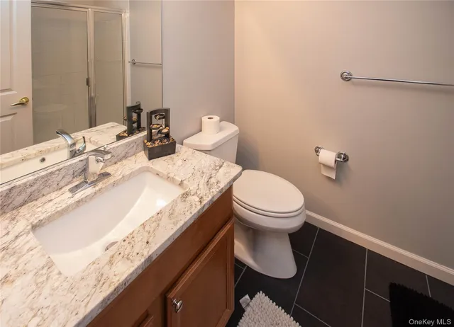 a bathroom with a sink and a toilet