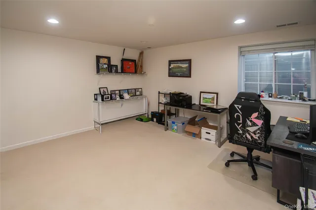 a view of a workspace with furniture