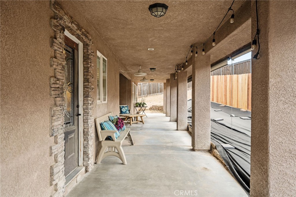 7575 Rancho Road Wrightwood, CA 92397 - Photo 23 of 32 a view of an entryway with wooden floor and a livingroom view