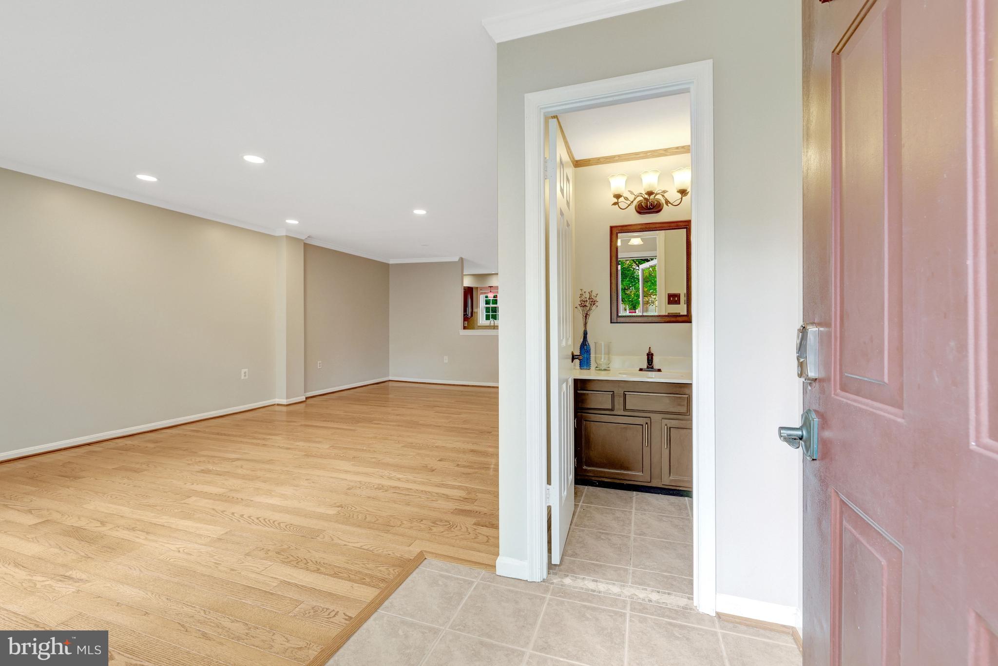 11992 Sentinel Point Court Reston, VA 20191 - Photo 10 of 49 Main level powder room entrance