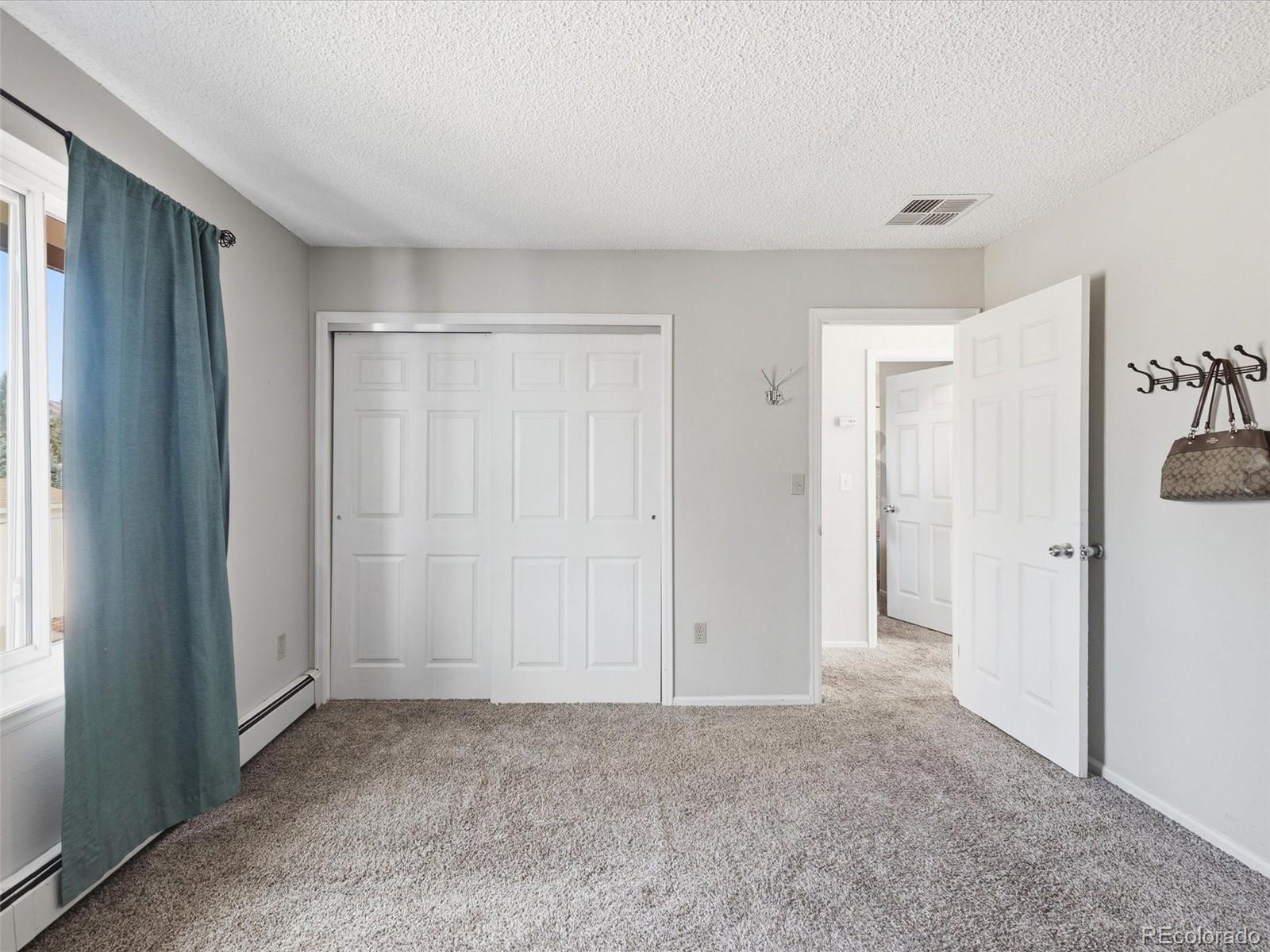 892 South Rifle Way Aurora, CO 80017 - Photo 22 of 32 a view of an empty room