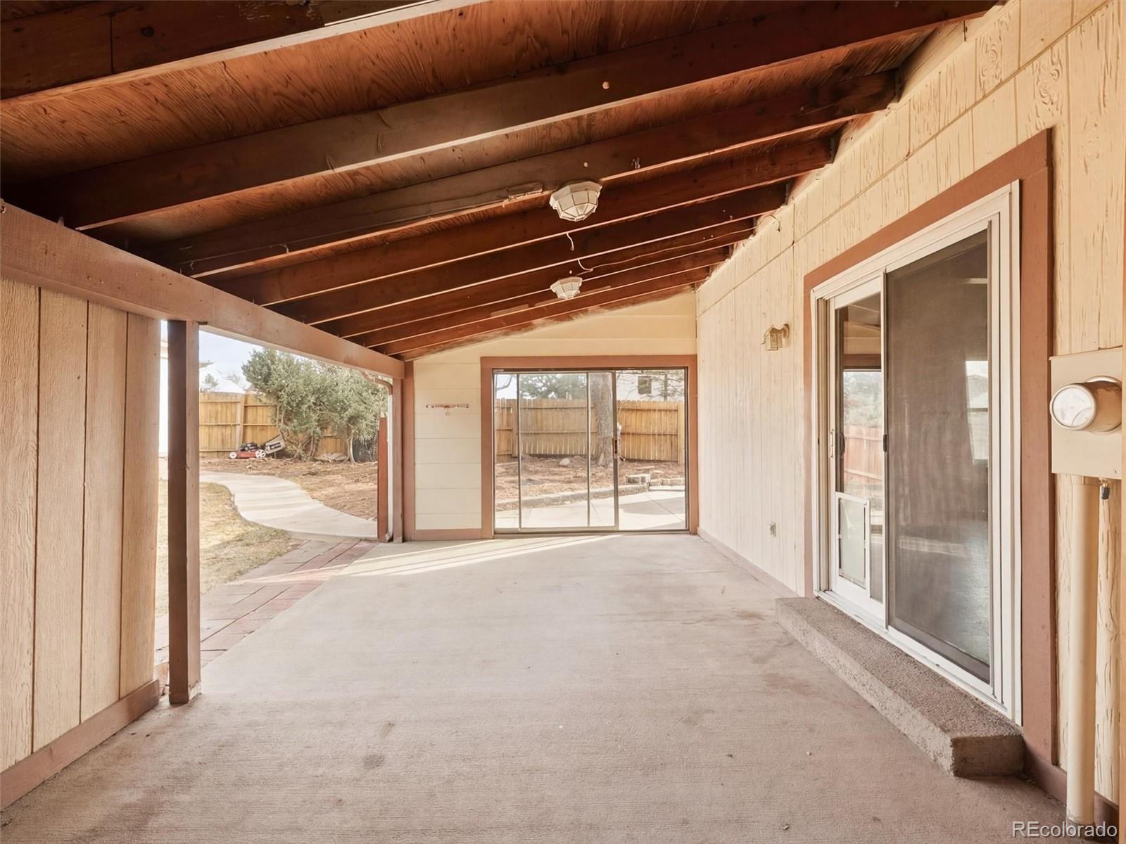 892 South Rifle Way Aurora, CO 80017 - Photo 26 of 32 a view of an empty room with a window