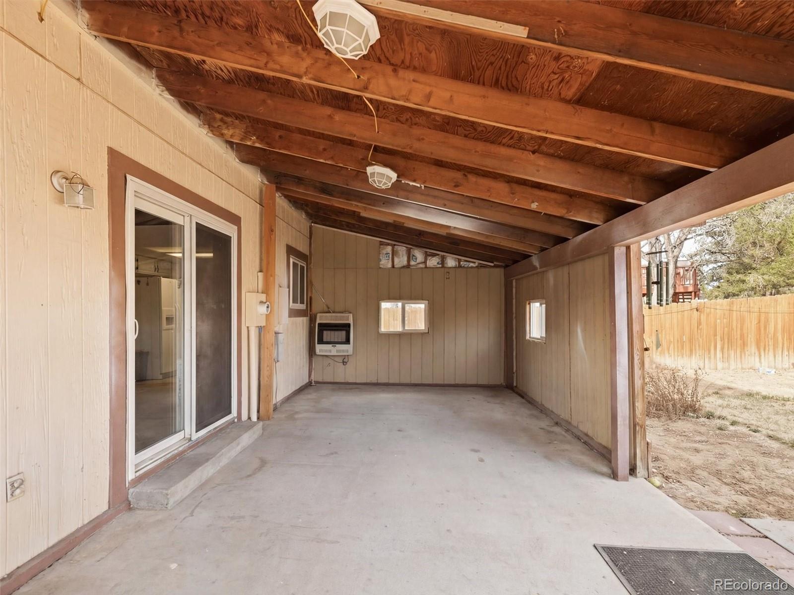 892 South Rifle Way Aurora, CO 80017 - Photo 27 of 32 a view of livingroom with an empty space
