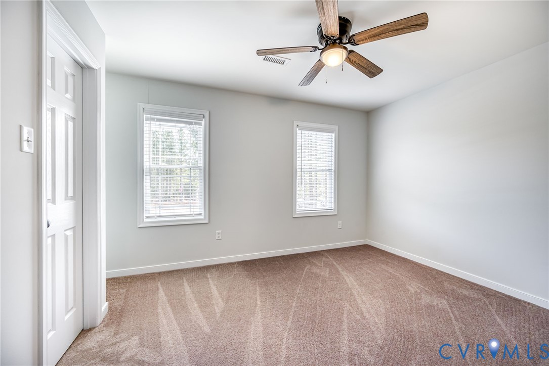 2024 Walnut Tree Place Powhatan, VA 23139 - Photo 15 of 30 a view of an empty room with a window