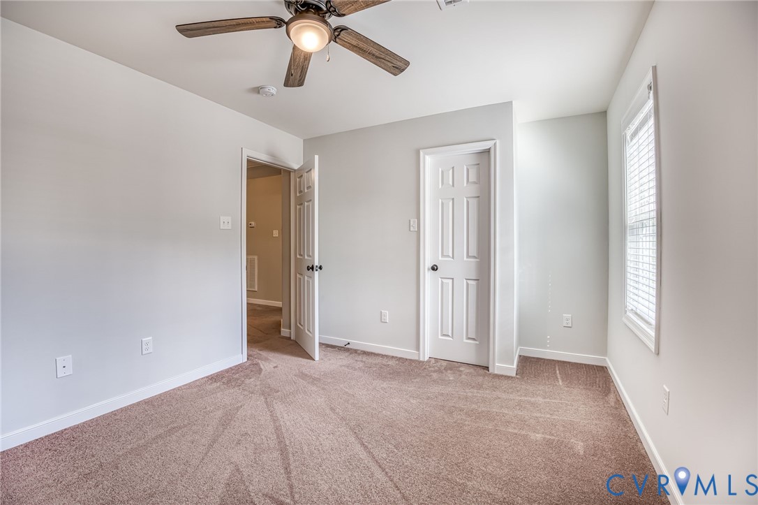 2024 Walnut Tree Place Powhatan, VA 23139 - Photo 16 of 30 a view of an empty room with a window