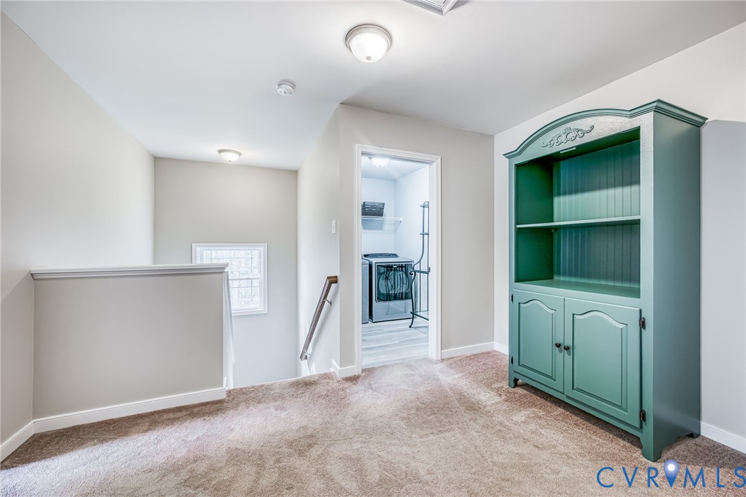2024 Walnut Tree Place Powhatan, VA 23139 - Photo 17 of 30 an empty room with closet and mirror