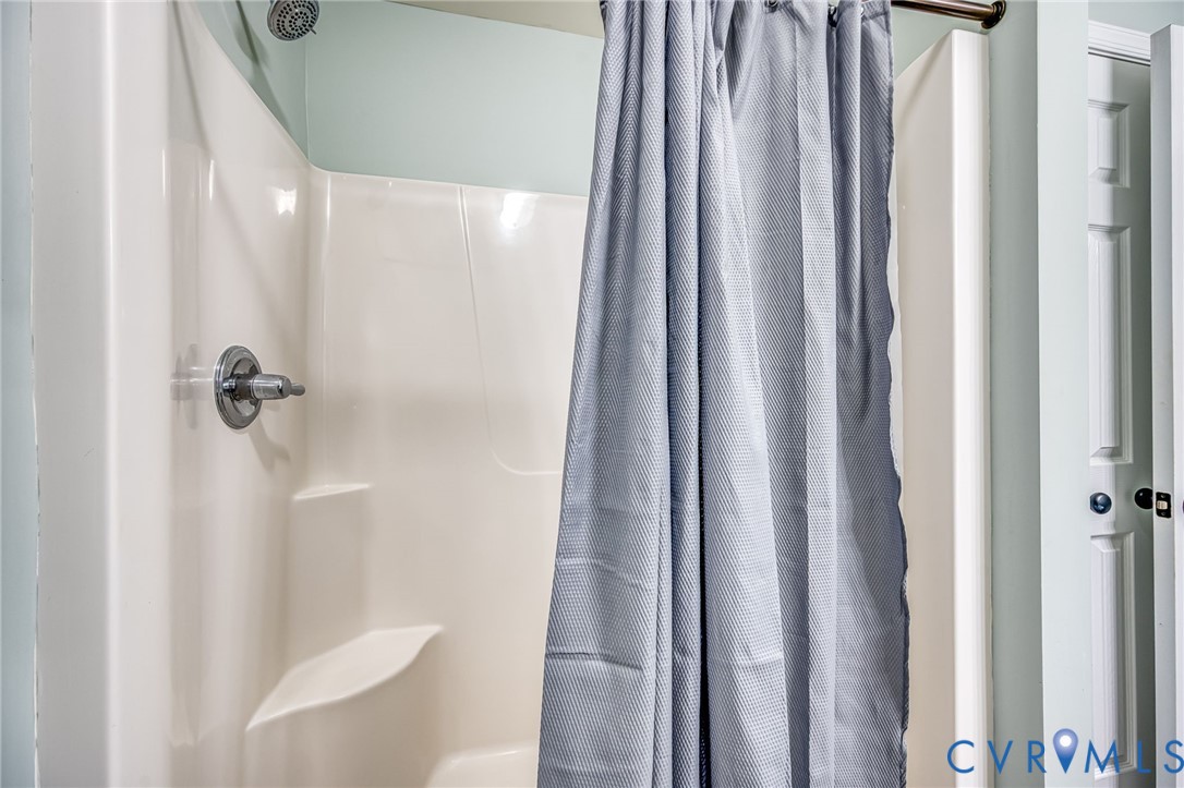2024 Walnut Tree Place Powhatan, VA 23139 - Photo 24 of 30 a bathroom with a shower