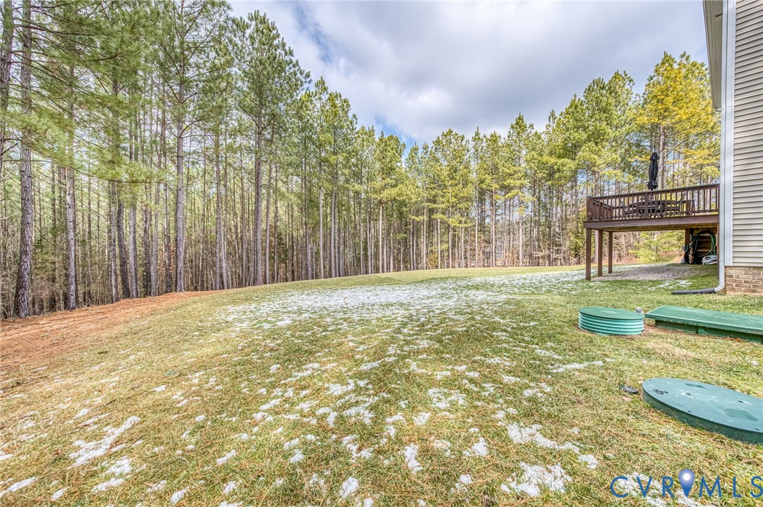 2024 Walnut Tree Place Powhatan, VA 23139 - Photo 28 of 30 a swimming pool with trees in the background
