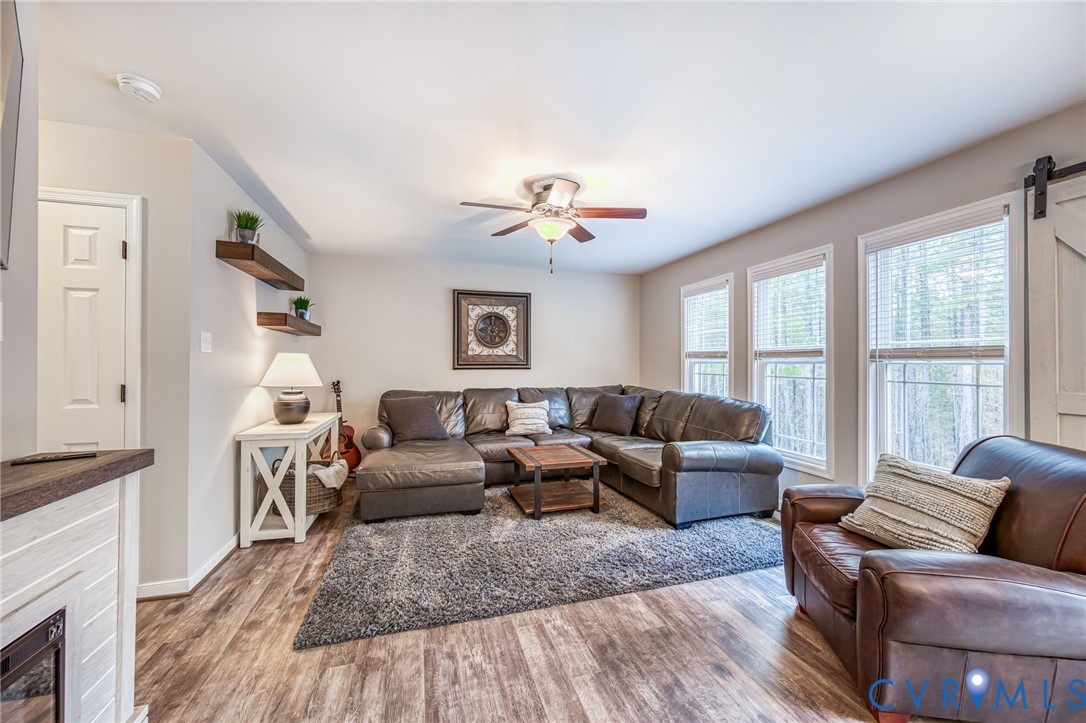 2024 Walnut Tree Place Powhatan, VA 23139 - Photo 6 of 30 a living room with furniture and a window