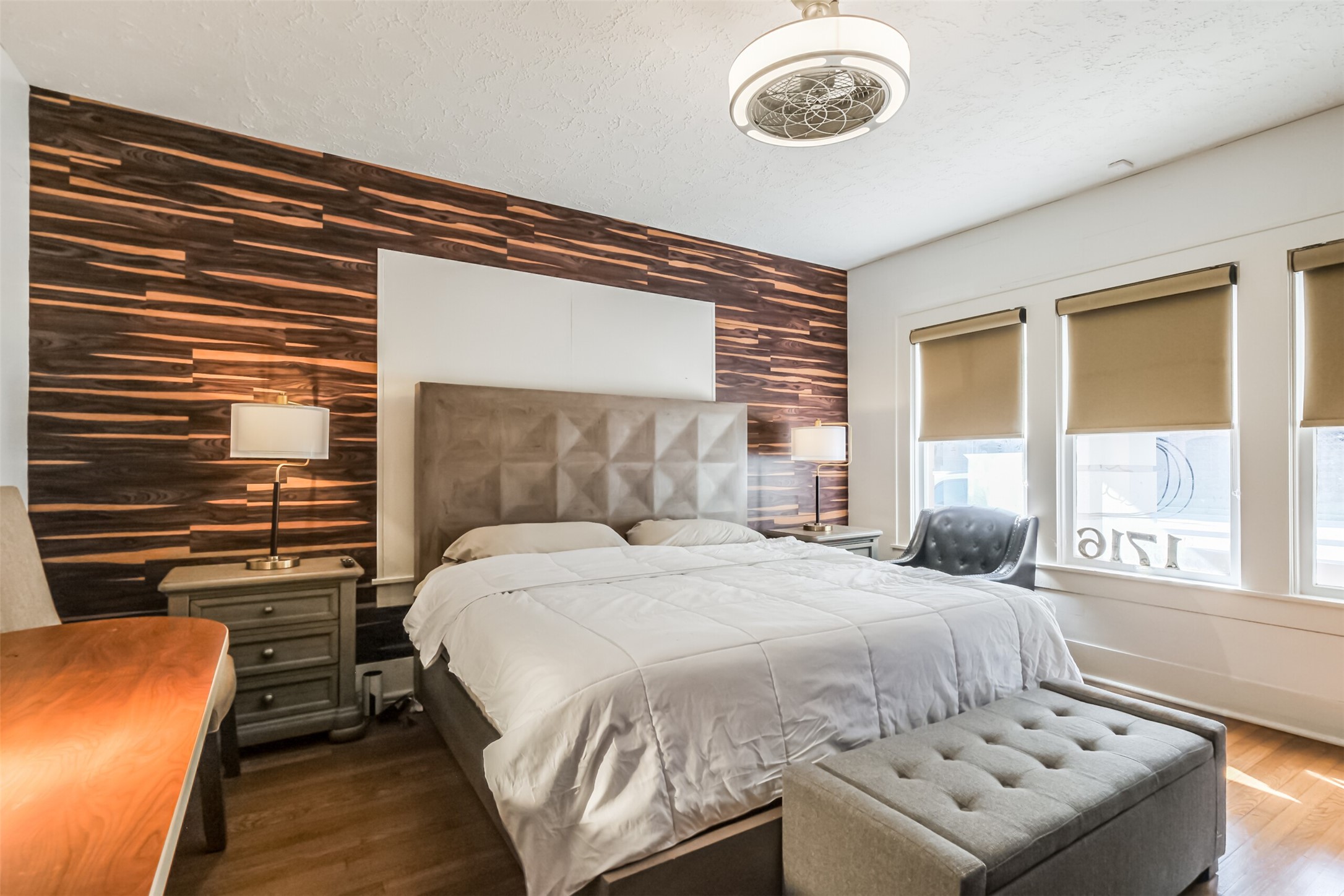 1716 Richmond Avenue, Unit 1 Houston, TX 77098 - Photo 13 of 22 a bedroom with a bed and a window