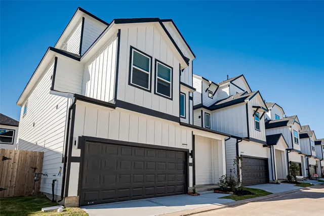 a view of a house with a garage