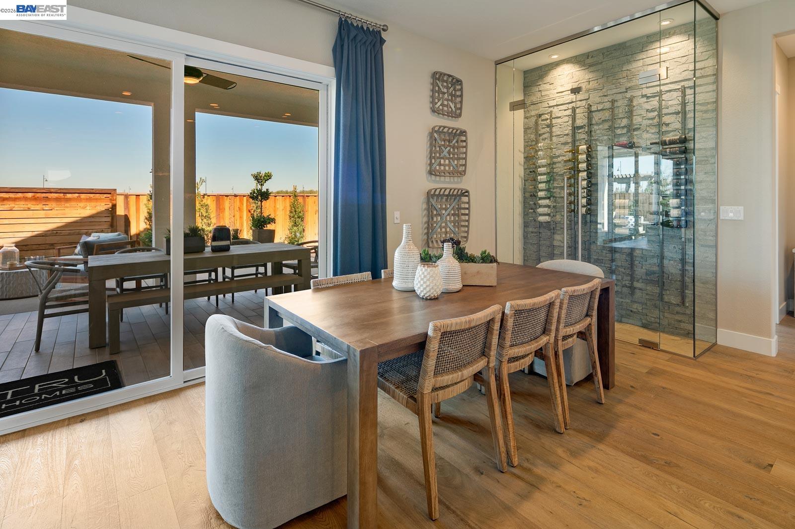 927 Conrad Street Manteca, CA 95336 - Photo 13 of 42 a dining room with furniture and wooden floor