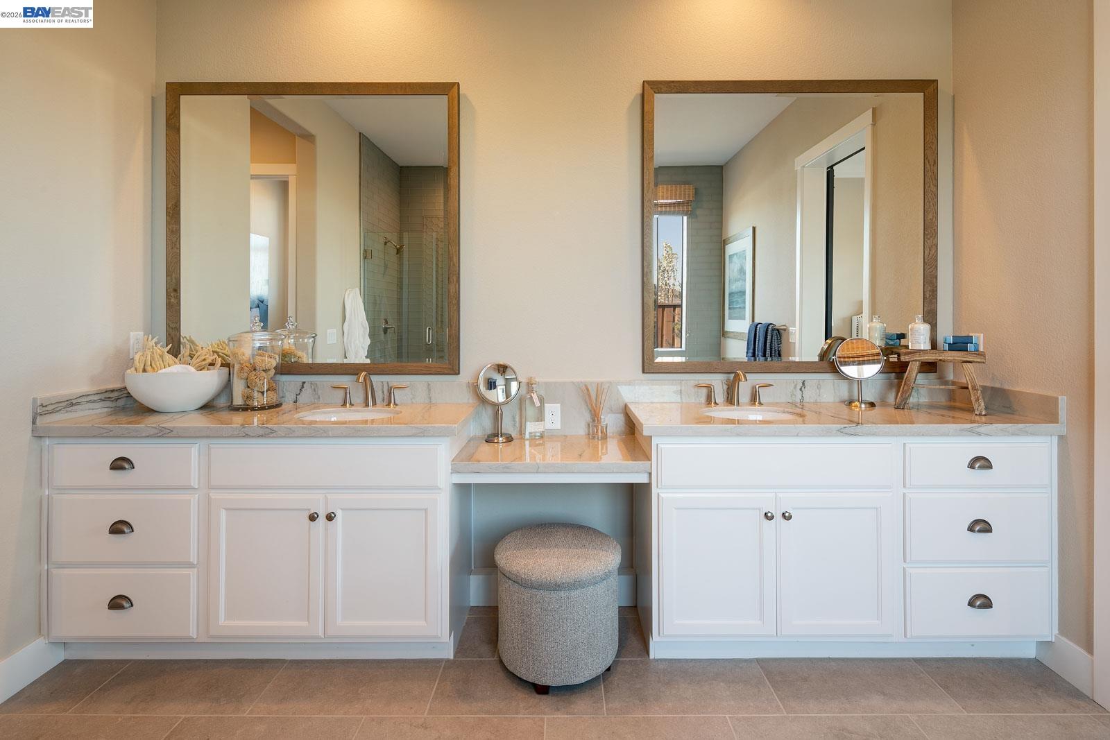 927 Conrad Street Manteca, CA 95336 - Photo 20 of 42 a bathroom with a double vanity sink and a mirror