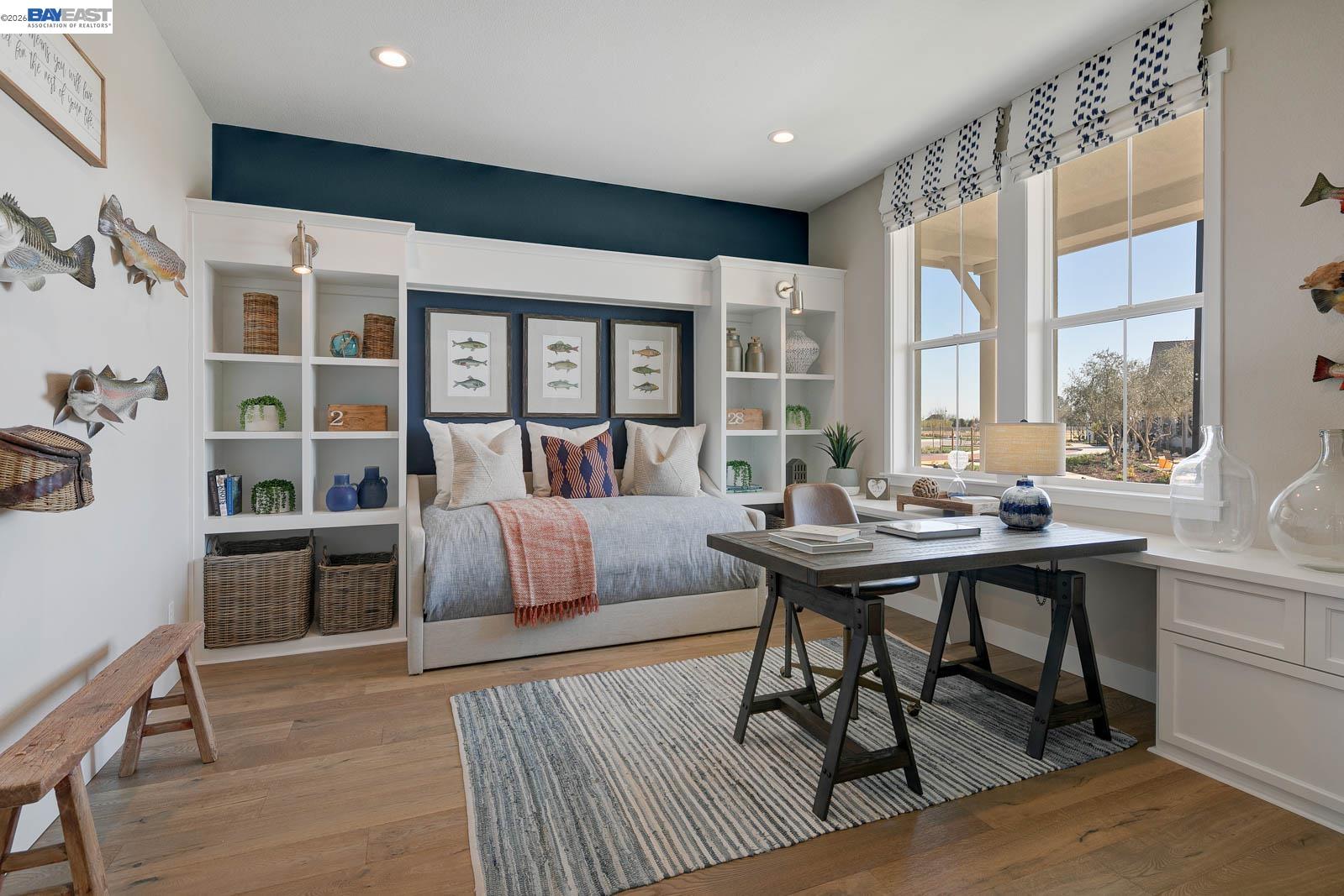 927 Conrad Street Manteca, CA 95336 - Photo 2 of 42 a living room with furniture wooden floor and a table